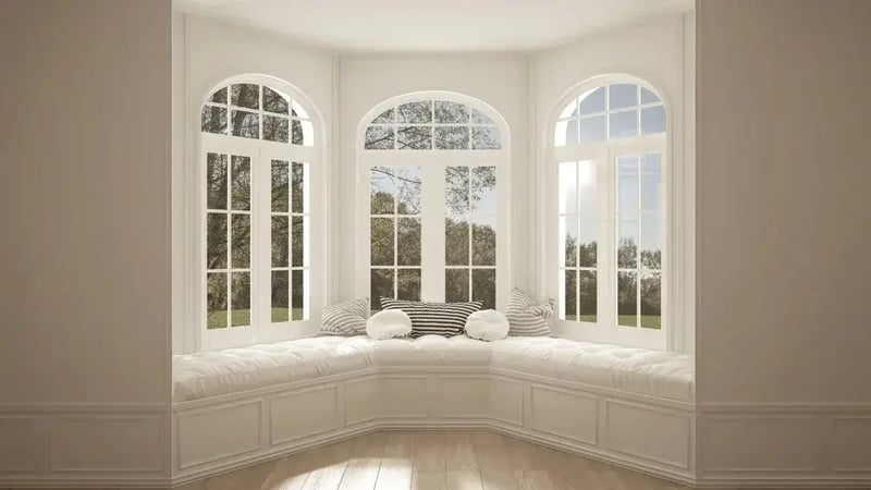 Arched windows above a curved window seat